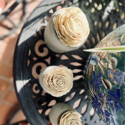 Wood Roses In Cement Planters 