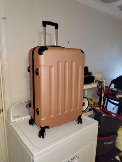 Very nice suitcase on wheels 28 in by 18 in x 12 in Nice condition