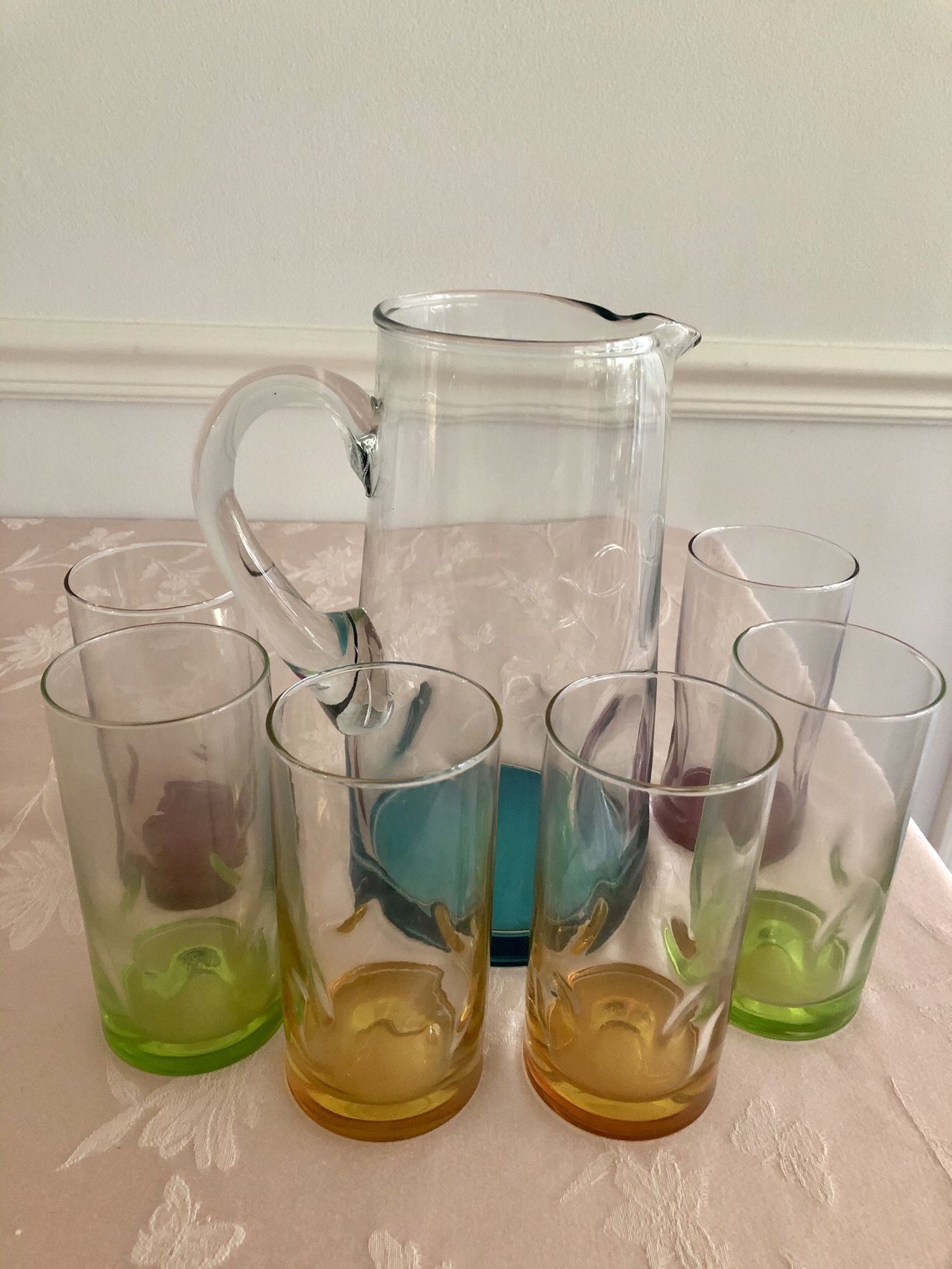 Beautiful unique pitcher and 6 glasses