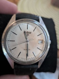 Pulsar
Pulsar
Quartz (by Seiko) Steel Case Date - Vintage 85 NOS Stunning Silver Dial with Applied Indexes and Black Graphics