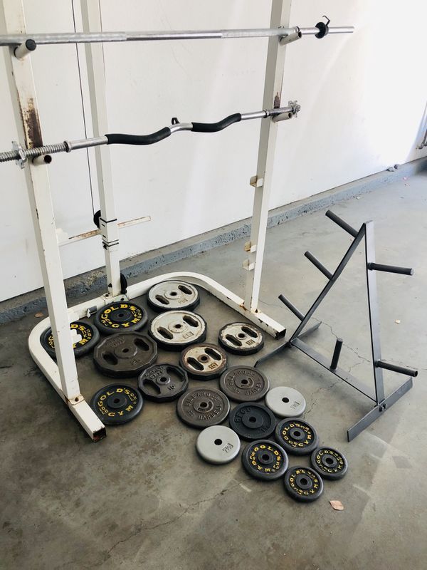 Weider Pro 355 squat rack with weights, 6 foot barbell, 4 foot curl bar