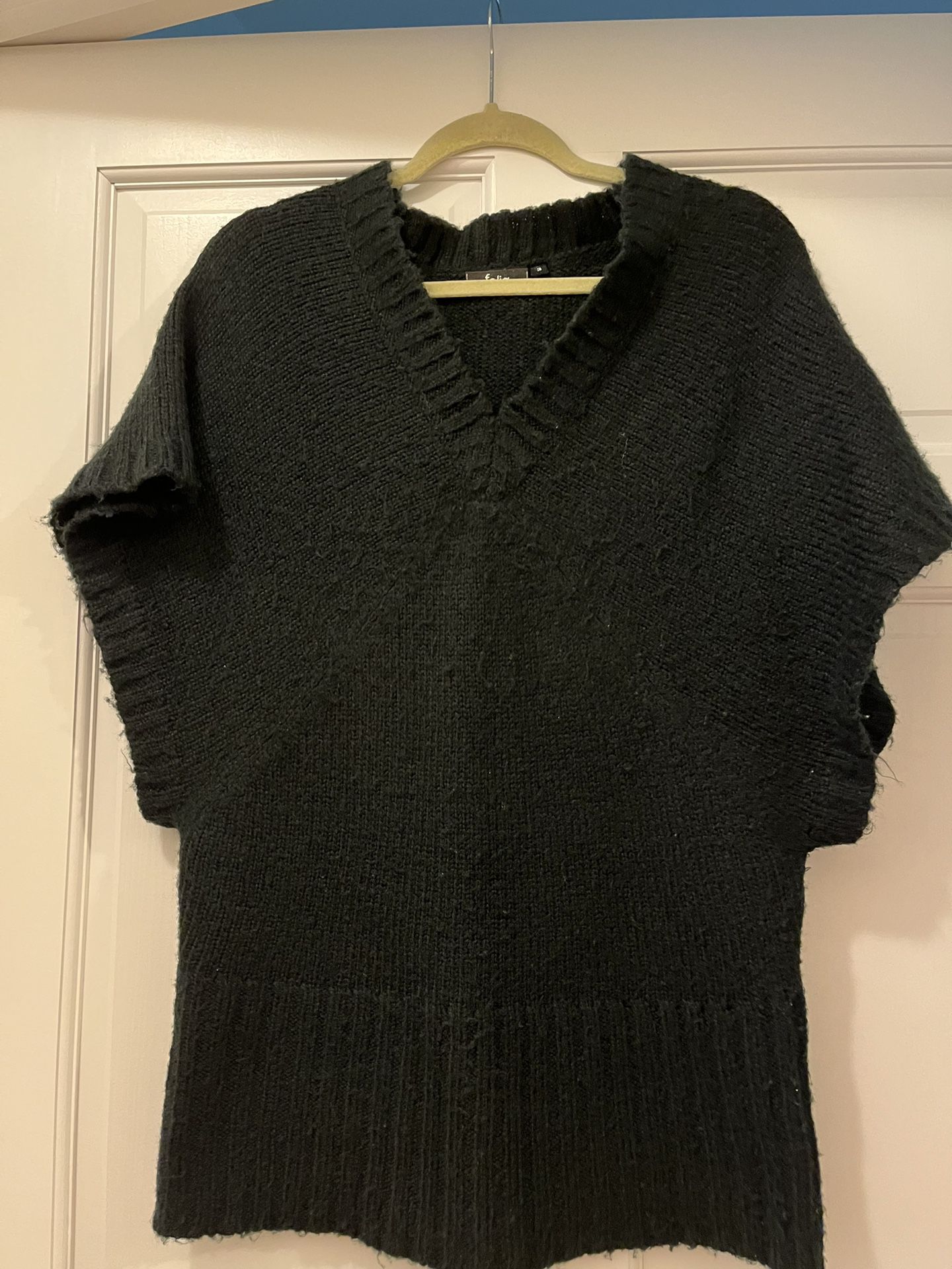 Black knit sweater, wide fit looks like size S/M 