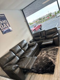 Limited time sale. Madrid, gray leather reclining sofa and loveseat set only $999. Easy finance option. Same-day delivery.