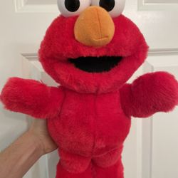 Vintage Tickle Me Elmo 15” Doll 1997 Tyco Sesame Street Laughs Talks, it laughs and talks great! It appears the vibration is very lite likely just sof