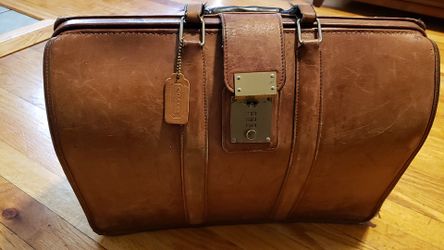 vintage leather Coach traveling suit case