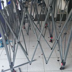 10x20 pop up canopy it s kinda broke however I tried putting together I'm just giving up comes with duffle bag tarp and the little metal things to ho