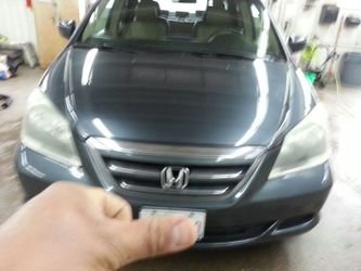 HEADLIGHT WET SAND & BUFF.