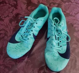 Nike racing shoes size 9.5. Well taken care of. Clean, great condition