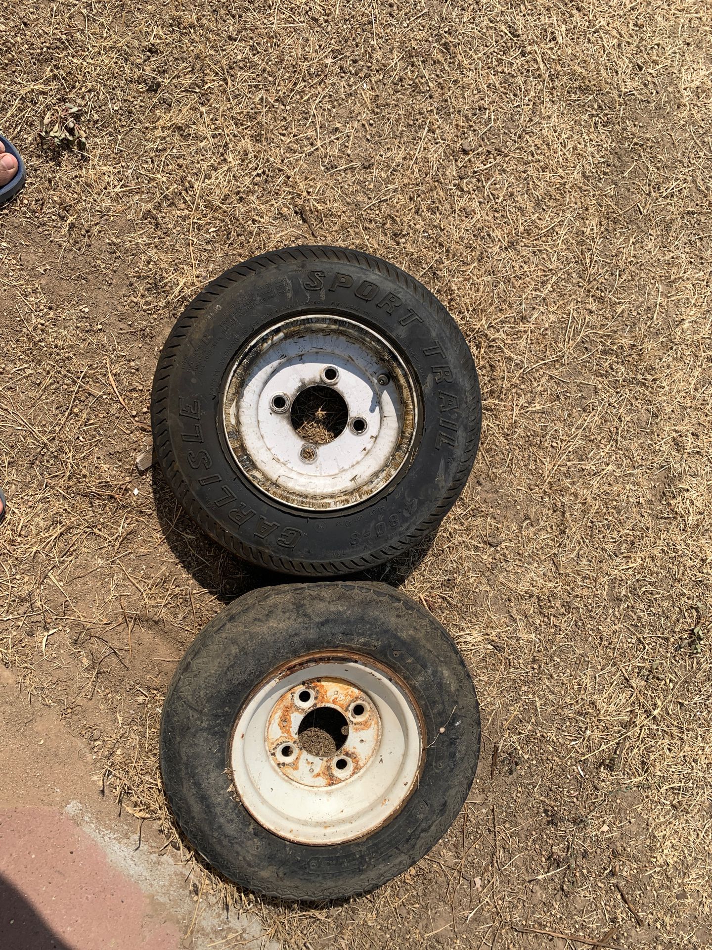Two 4.80-8 trailer rims only, tires are no good.. 10 dollars