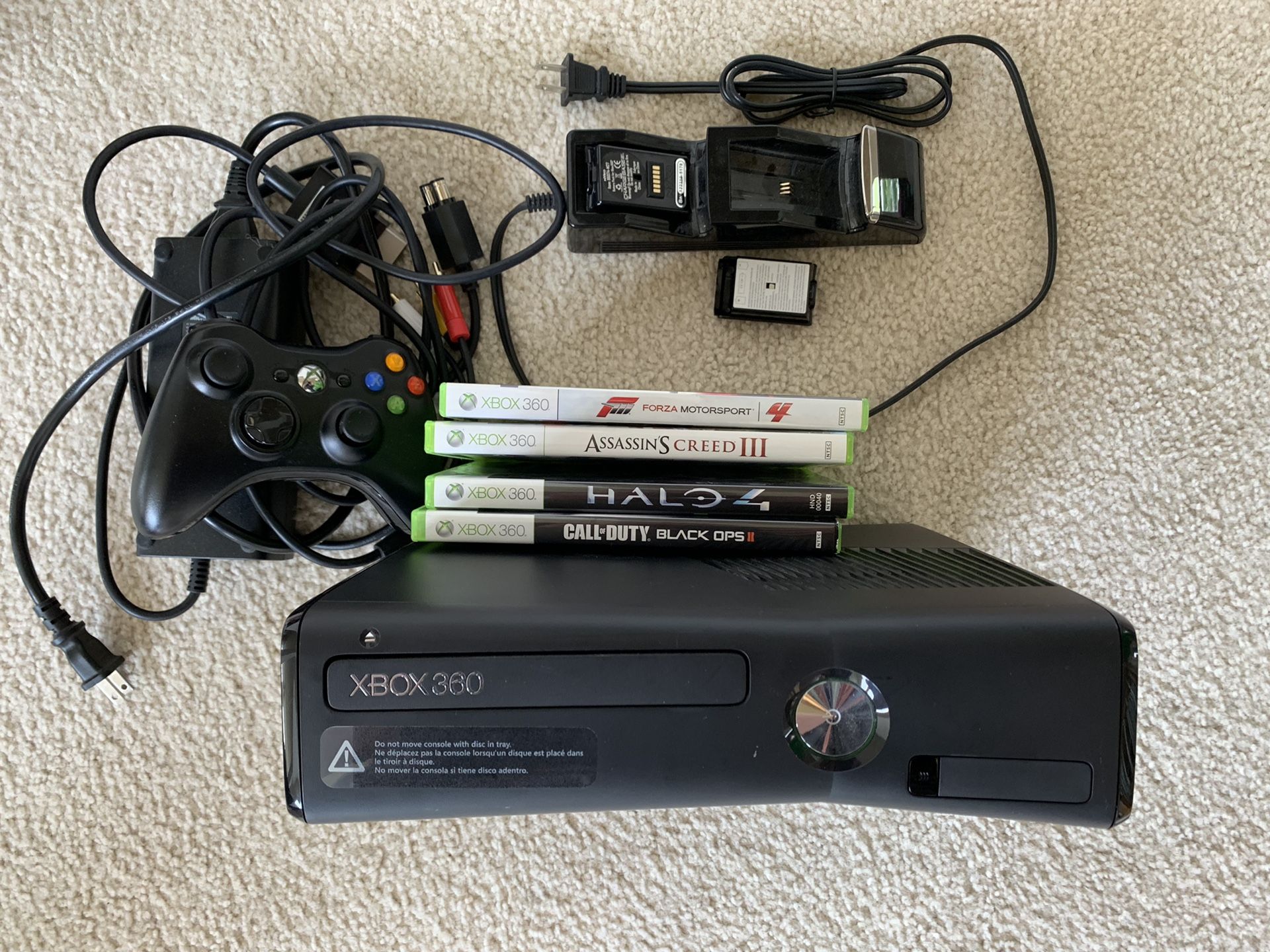 Xbox 360, one controller, and 4 games for sale.