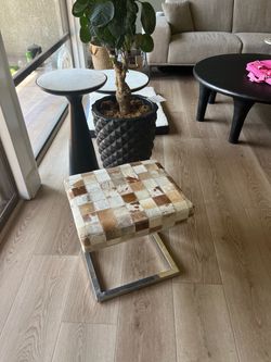 Hide on hair ottoman/ foot stool
