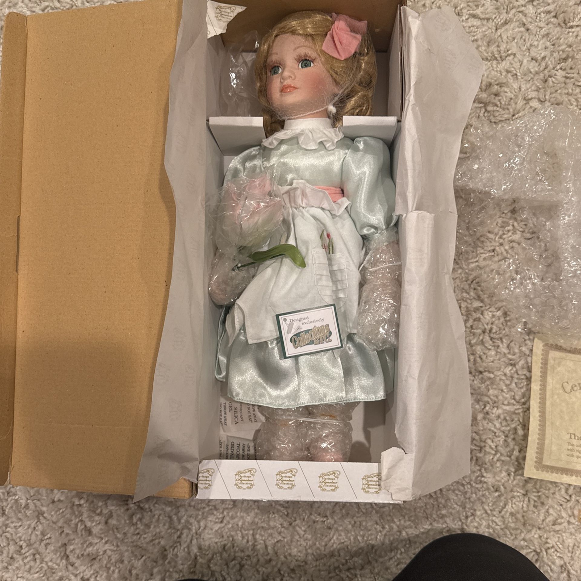 Floral porcelain doll with stand