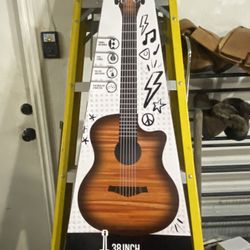 mini Guitar Ages Eight