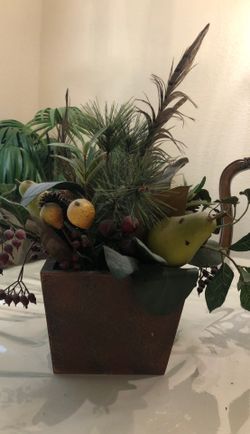 Vase with artificial plants