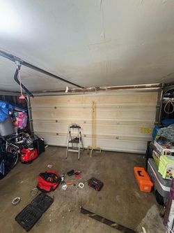 Overhead Garage Door Broken Spring Opener Off Track Adjustment Replace And Parts