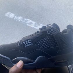 Jordan 4 Black Cat