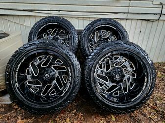 22" Monster Rims with All terrain tires 22x12