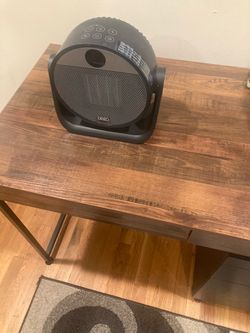 Compact mini heater and fan combo made by DREO