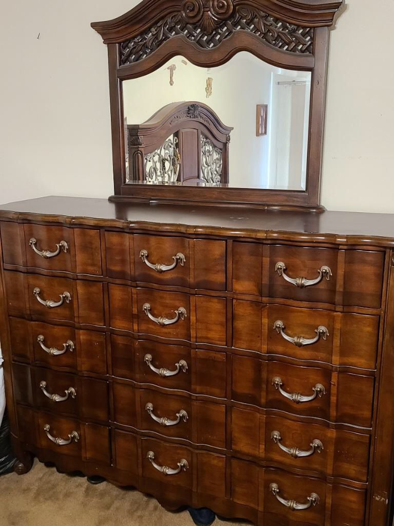 Dresser with 15 drawers/mirror, California King Bed, two three drawer nightstands