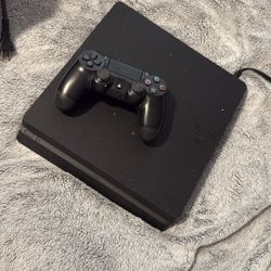 PS4 with controller 