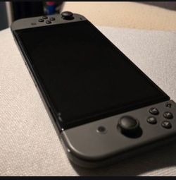 Switch OLED no scratches, comes with cords/dock and extra controllers