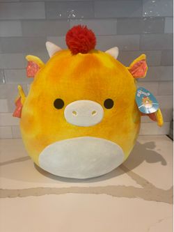 16-inch Squishmallows plush is the character "Dieric," a yellow dragon with an orange mane