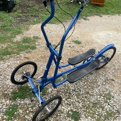StreetStrider elliptical bicycle, likely a 3i or 7i model based on the blue frame and branding.