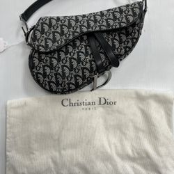 CHRISTIAN DIOR SADDLE CANVAS MONOGRAM BAG, COMES WITH DUST BAG, IN GOOD CONDITION, ENTRUPY VERIFIED