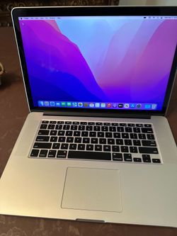 Apple MacBook Pro 2’8 GHz i7 processor 16 Gb Ram 256 Gb ssd ps Monterey very clean with Charger