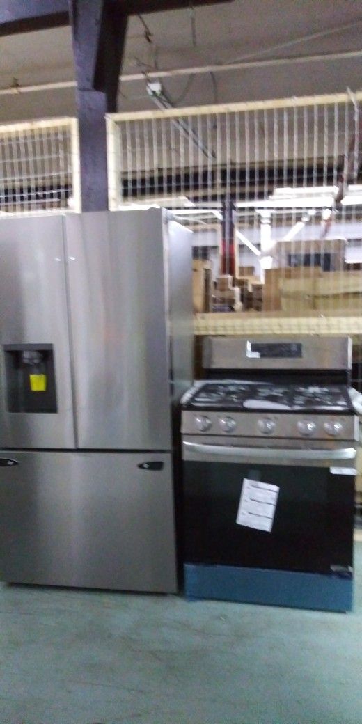 New LG French Refrigerator With New LG Five Burner Range