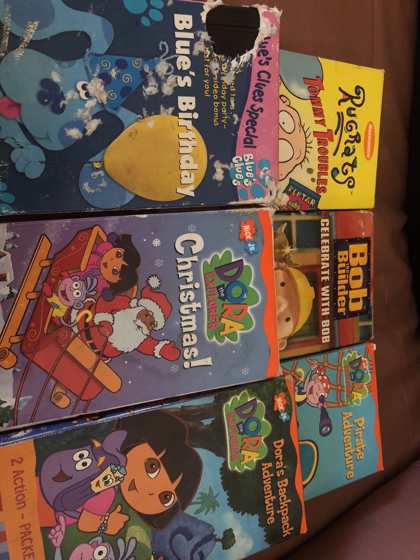 VHS tapes Rugrats Bob the builder blues clues and Dora the explorer