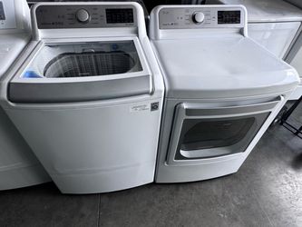 LG washer top loader and LG dryer dryer electric