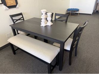 Dining table with 4 chairs and a bench
