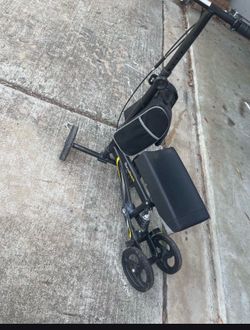 Knee walker (used) and  walker (new)