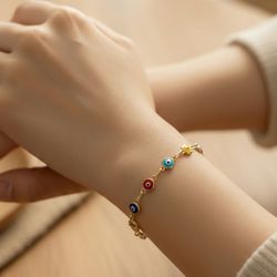 Pulsera Con Ojitos Oro 10K 