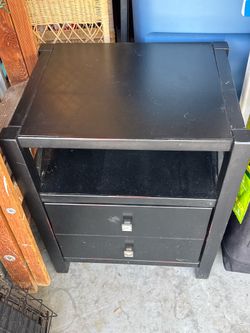 Black wooden bedside stand