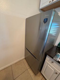 Midea 18.7 Cu. Ft Stainle.almost new , first brings $400 now firm take it Costa Mesa