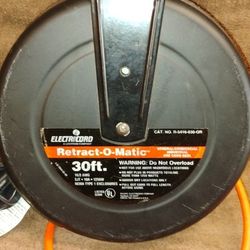 Retract-O-Matic,  30' Unused.  $25