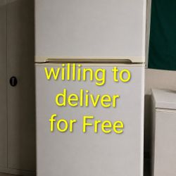 Kenmore top-freezer refrigerator in good working condition. Clean and ready 