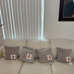 7 gray plushie pillows