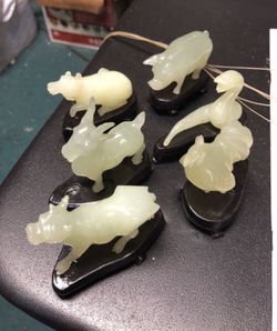 Jade animals on stands
