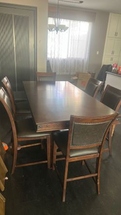 Dining room table with chairs