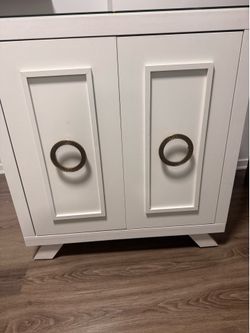 White and gold liquor cabinet