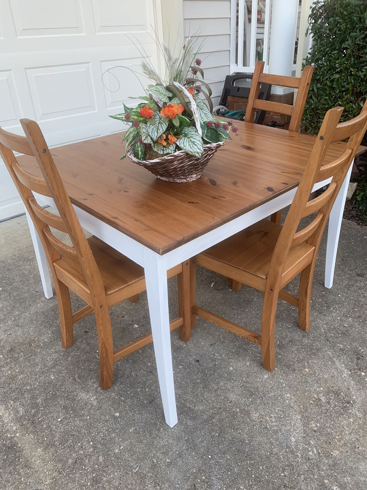Farmhouse table and three chairs