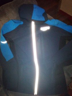 Luly Yang Amazon DSP navy blue and light blue tropical shell jacket. Hooded. Unisex. Size medium.