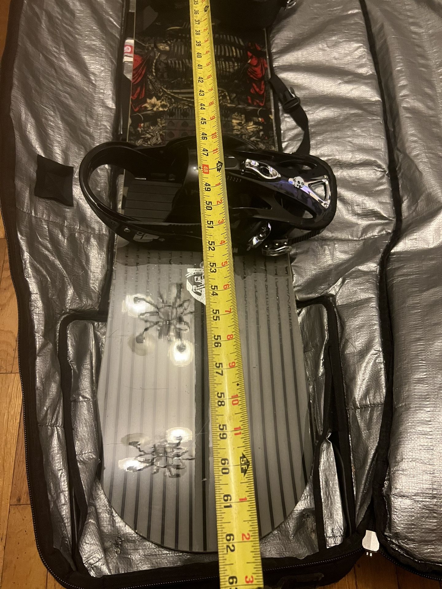 Burtons Snow Board With Bindings And Travel Bag.