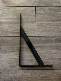 Two Black Brackets