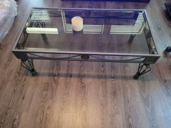 Glass-top coffee table