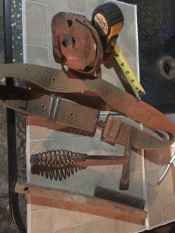 Tape measure & holder, slag hammer, wire brush, belt