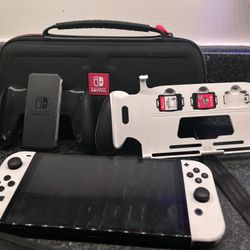 Nintendo Switch Oled With Travel Case,extra Remote And Games
